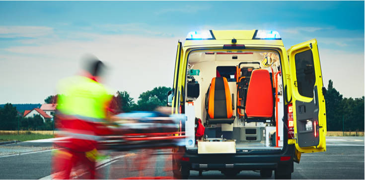 EMS crew carrying durable EMS trauma bags during emergency response.